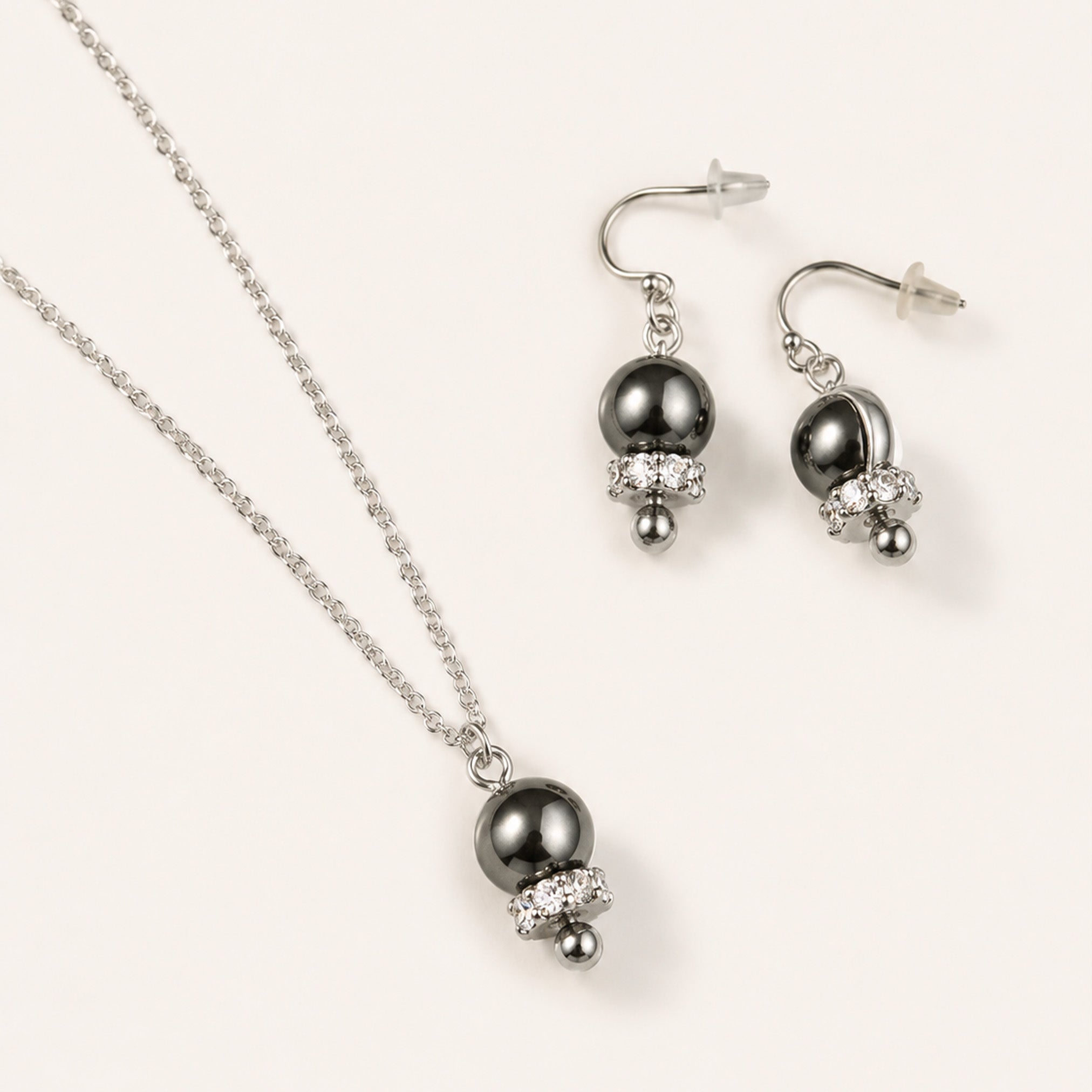 Bell Necklace and Earrings, in steel